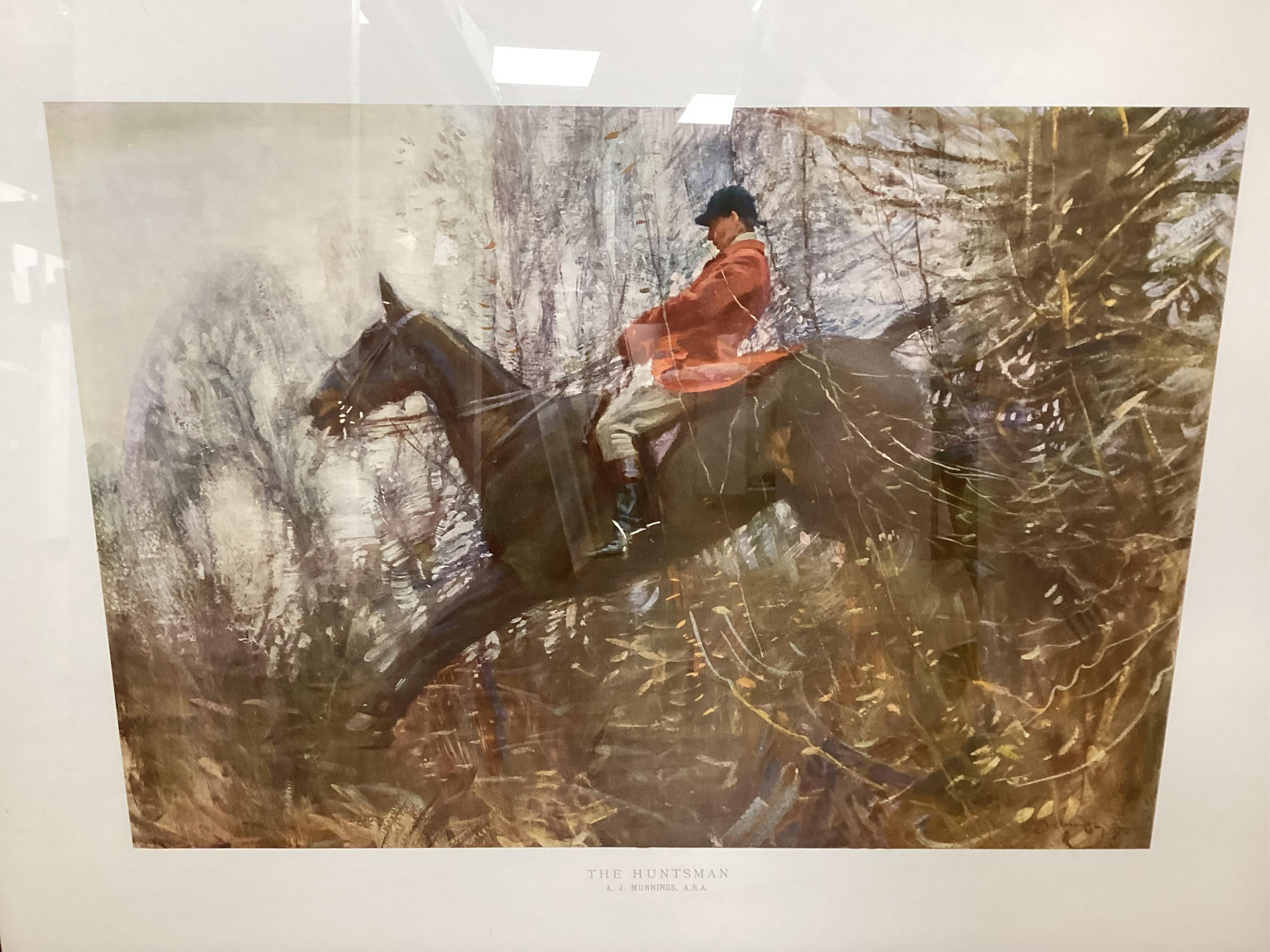Four hunting interest prints after Snaffles, Munnings and Aldin to include ‘The Finest View in Europe’ and ‘The Huntsman’, largest 54 x 74cm